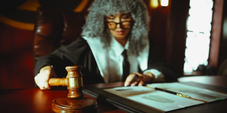 Judge in courtroom with gavel, representing legal ruling on sports betting regulations.