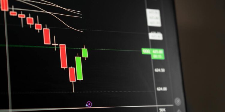 Charts showing declining cryptocurrency trading volumes with a downward trendline.