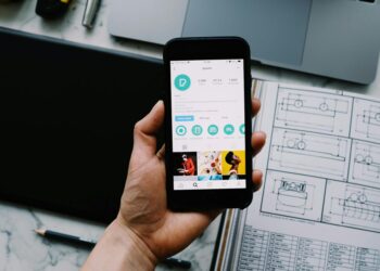 A smartphone displaying a fake Instagram account claiming to be Ripple's CEO.