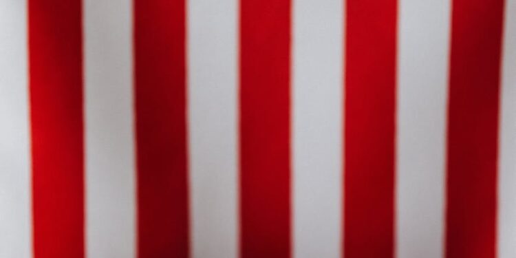 Digital currency symbols overlaying U.S. flag with cash and Republican campaign materials.