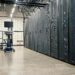 Data center with servers highlighting AI processing power for CoreWeave and Anthropic partnership.
