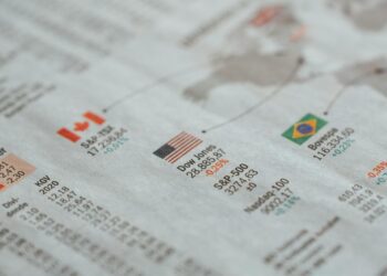 Polymarket logo overlaid on a financial news backdrop, highlighting regulatory updates.