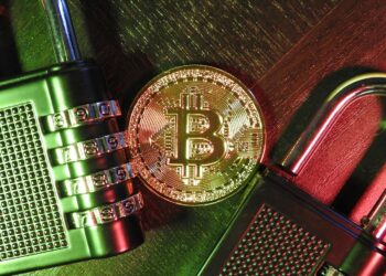 A digital representation of a blockchain with security locks and warning symbols.