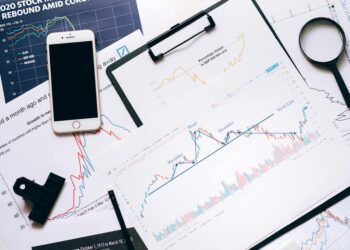CoinShares logo with Nasdaq and SPAC financial graphics in the background.