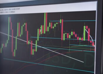 Bitcoin chart with fluctuating prices alongside symbols of DeFi and regulatory icons.
