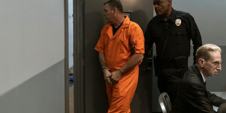 Gannon Ken Van Dyke being escorted by law enforcement after his insider trading arrest.