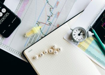 Aave logo with financial charts and risk management documents in the background.