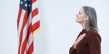 Senator Moreno speaks at a podium, outlining the CLARITY Act deadlines for crypto regulation.