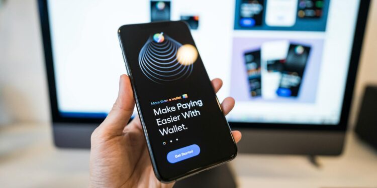 A smartphone displaying Tether's new self-custodial wallet interface with cloud backup options.