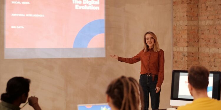 A Google Cloud executive presenting the new AI fund initiative at a tech conference.