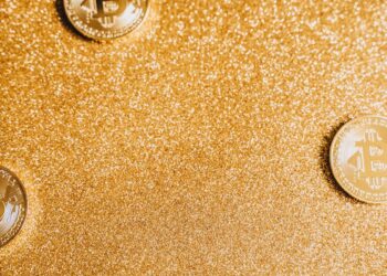 Bank of Korea building with digital currency graphics, symbolizing CBDC focus in finance.