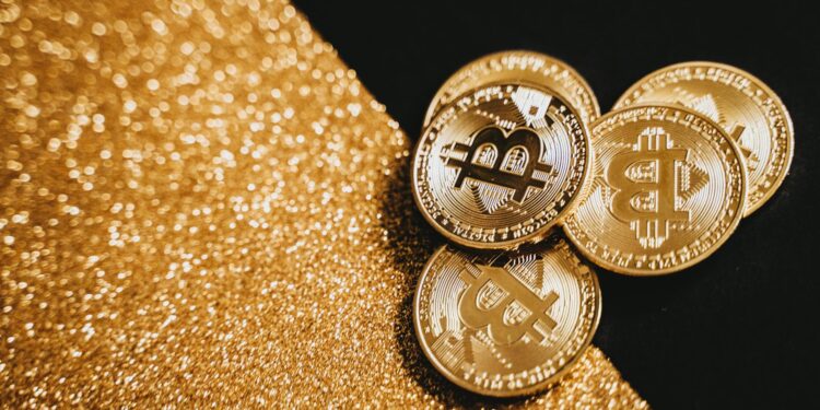 Gold bars and cryptocurrency symbols representing OCBC's tokenized gold fund initiative.