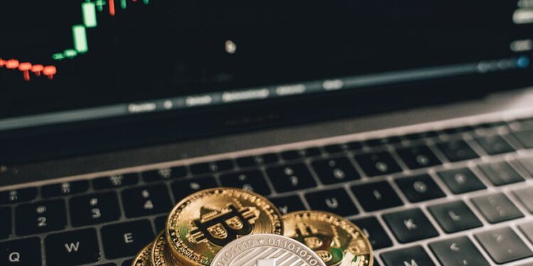 Crypto coins and a computer screen displaying financial data related to the Drift hack.