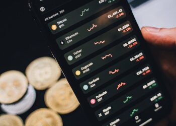 A person using a cryptocurrency wallet app on a smartphone, highlighting Solana assets.