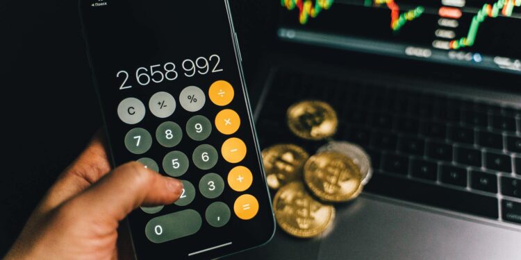 Bitcoin coins displayed with financial charts and a calculator, symbolizing debt resolution.