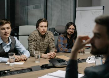 Ripple and Kyobo Life executives discussing bond tokenization strategies at a conference table.