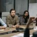 Ripple and Kyobo Life executives discussing bond tokenization strategies at a conference table.