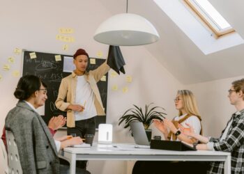 Aave DAO members discussing a $25M grant proposal for Aave Labs development.