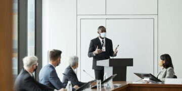 Lobbyists advocating against stablecoin regulations in a conference setting.