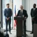 A South Korean official at a podium discusses Coinone's $3.5M AML violation fine.