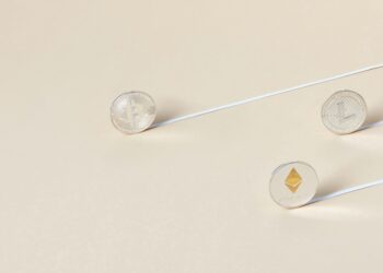 A digital illustration showing a broken blockchain with falling cryptocurrency coins.