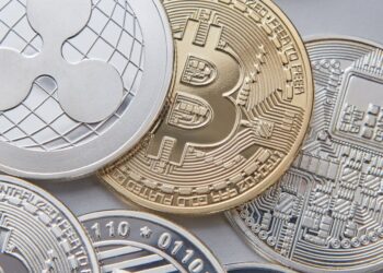 Graphic showing interconnected blockchain networks with cryptocurrency symbols representing cross-chain transactions.
