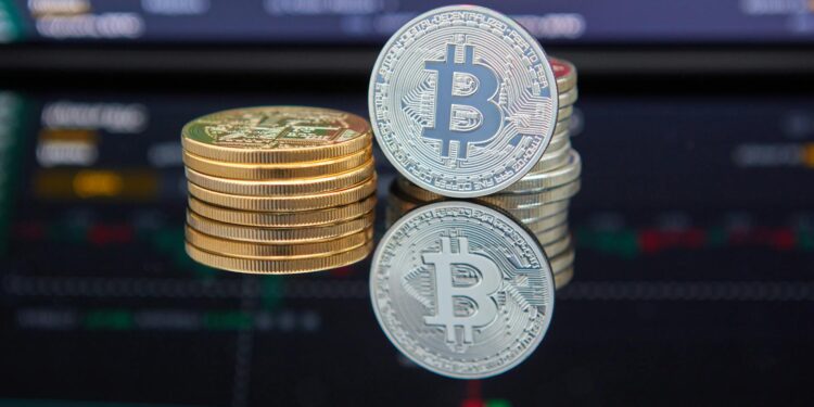 A bank office with financial charts and cryptocurrency coins on a desk, symbolizing consolidation.