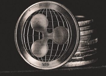 Cryptocurrency coins with a rising graph, symbolizing XRP's potential growth.