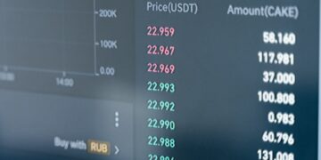 A visual representation of cryptocurrency trades and tax documents on a digital screen.