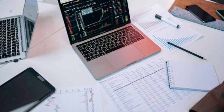 Politicians examine documents related to insider trading allegations in finance.