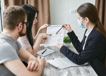Insurance agent discussing kidnap-ransom coverage for crypto and cannabis sectors.