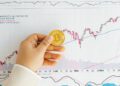 Financial graph showing cryptocurrency trends with Japan's flag in the background.