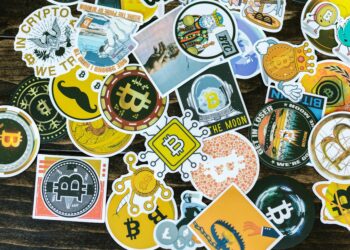 Open-source mining development kit for Bitcoin showcased with crypto graphics and logos.