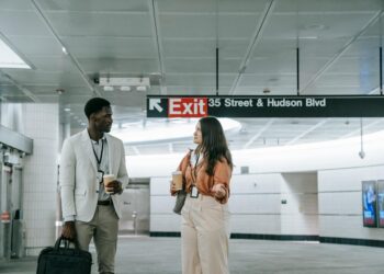 Workers exiting a Meta office building in California following recent layoffs.