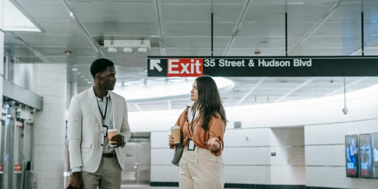 Workers exiting a Meta office building in California following recent layoffs.