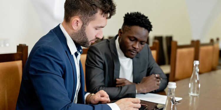 Bank representatives discussing digital currency integration at a conference table.