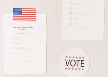 A close-up of Wayne County ballots and a gavel on a desk, symbolizing election integrity.