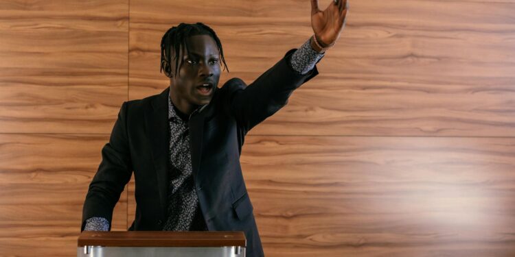 Trump speaking at a podium, gesturing while criticizing Energy Secretary Wright on gas prices.