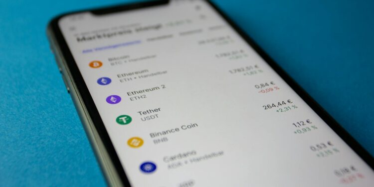 A Tether logo is prominently displayed on a digital currency trading platform screen.