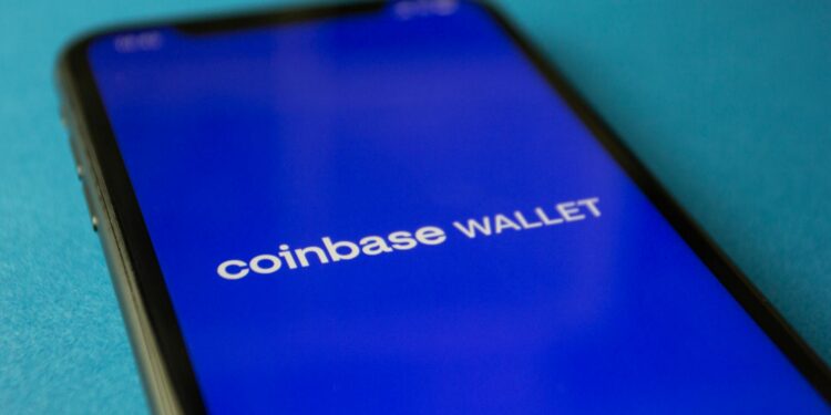 Coinbase CEO discussing cryptocurrency regulation at a financial event.