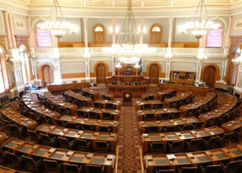 Minnesota lawmakers discuss regulations on AI-created explicit content in a legislative session.