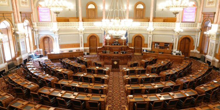 Minnesota lawmakers discuss regulations on AI-created explicit content in a legislative session.