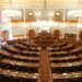 A Senate hearing room with lawmakers discussing cryptocurrency regulations.