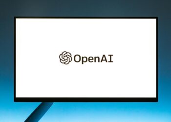 OpenAI logo alongside logos of AWS and Google Cloud, symbolizing new partnerships.