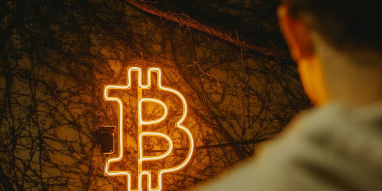 TRON DAO and Securitize logos with a Bitcoin backdrop at a finance event.