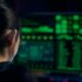 A cybersecurity analyst reviews a computer screen displaying a Linux vulnerability report.