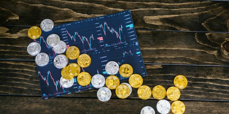 Crypto coins scattered with a backdrop of financial charts and sanctions symbols.
