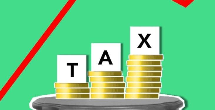 Coins representing stablecoins with a tax symbol overlay and financial graphs in the background.